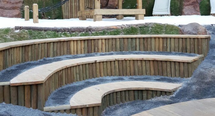 Outdoor learning area at Colegio Maya School featuring natural and modular